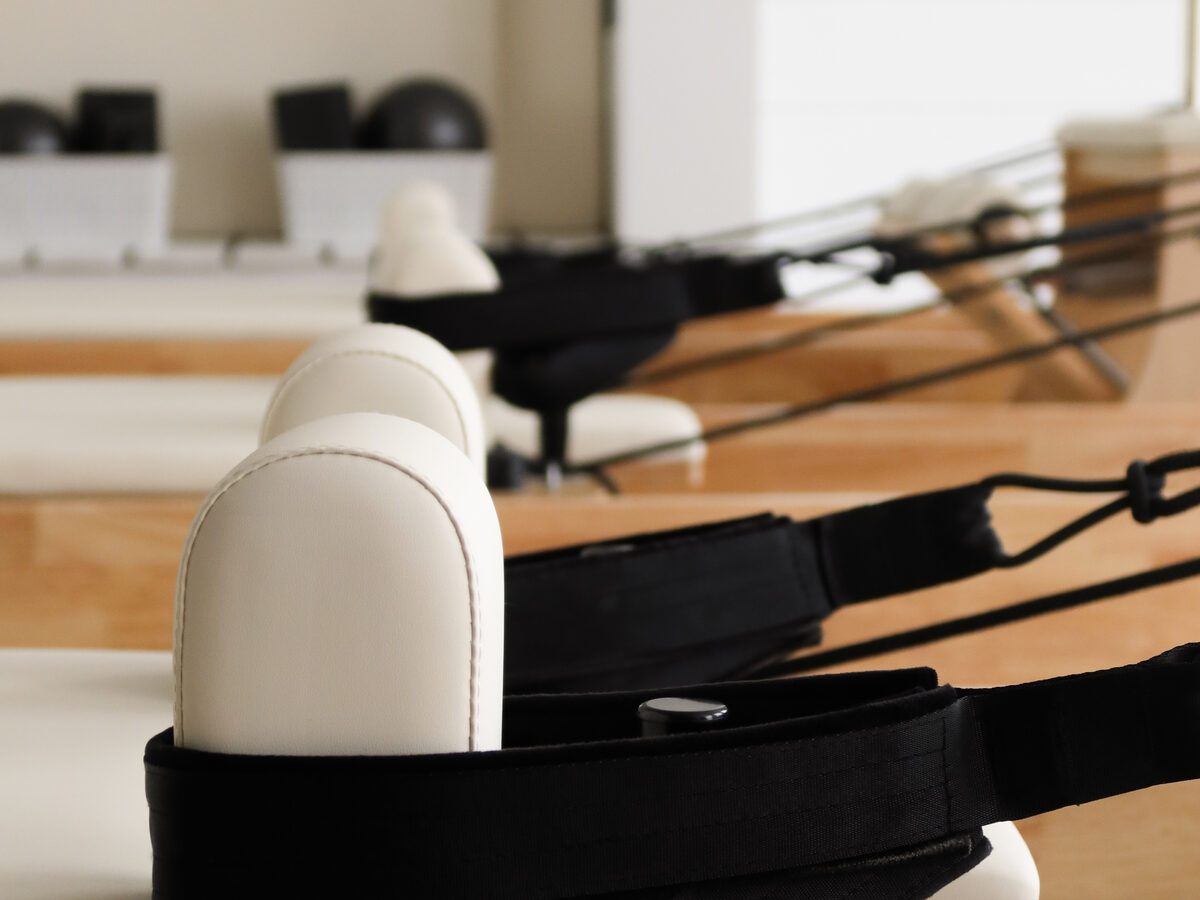 Reformer carriage, shoulder rests and straps in the ALYN studio